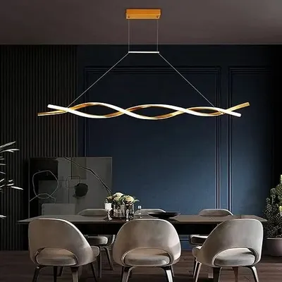 This modern LED chandelier features a curled, ribbon-like design in a golden finish. It's a minimalist yet dramatic statement piece, perfect for hanging above a contemporary dining table to provide sleek, integrated lighting.