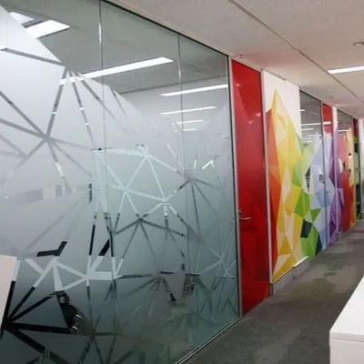 This geometric frosted glass film adds a modern, professional look to an office space. It provides necessary privacy for meetings while enhancing the interior design with a sharp, contemporary pattern.