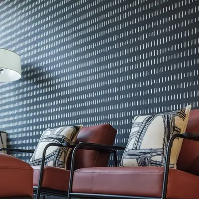 For a law office, I designed this smart and clean wallpaper with a pattern resembling a modern ikat or stitch mark. The dark color and repeating lines create a sophisticated, contemporary look.