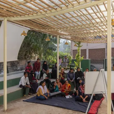 The Basera Community Plaza in Ahmedabad, designed as a safe and inclusive space for a women-led organization. The tiered seating and open pavilion create a flexible environment for workshops, meetings, and daily conversations.