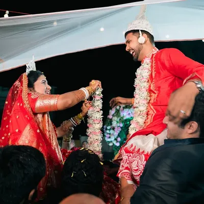 The 'Shubho Drishti' ritual in a Bengali wedding, where the bride and groom see each other for the first time, is always full of laughter and joy.
