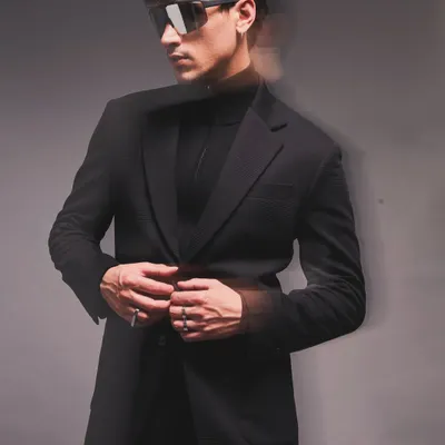 A lesson in monochromatic dressing for a menswear campaign. I styled this all-black look with a long coat, turtleneck, and futuristic sunglasses, using motion blur to add a dynamic and edgy feel to the sartorial look.