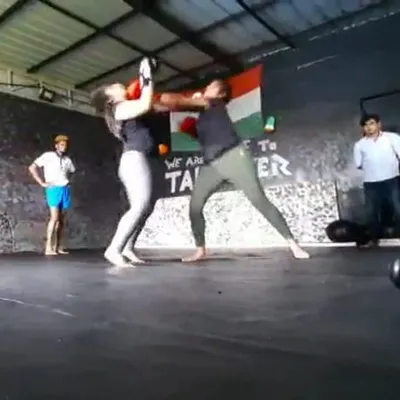 Dr. Mariya Kikali, a radiation oncologist, spars during a session. She started training with us to stay motivated and now competes in inter-club wars, proving that anyone can learn to fight and finish all three rounds.