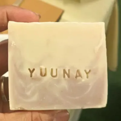 A custom-stamped soap bar for 'Yuunay'. This is a great example of how I can personalize my standard soap bars for corporate orders or special events, adding a unique touch to your gift.