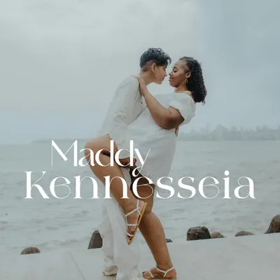 A beautiful, romantic lift against the backdrop of the sea. This image celebrates the couple's love and connection in a powerful and joyful way.