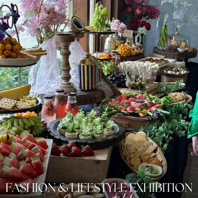 For a fashion and lifestyle exhibition, we created a grazing table that was as stylish as the event itself. The spread included fresh fruits, artisanal cheeses, and elegant canapés, all interwoven with lush greenery and floral arrangements.