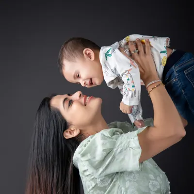 There's nothing like a mother's love. This beautiful moment of a mom lifting her baby up is pure happiness.