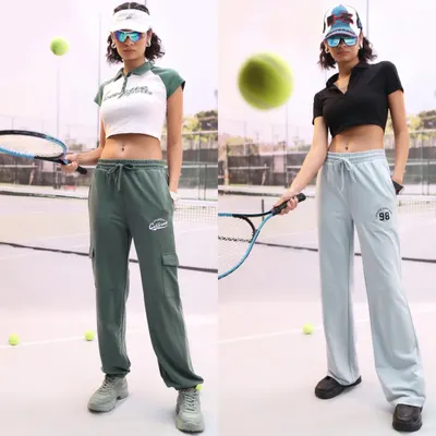 A fun day on the court for this tennis-themed shoot. I styled two different looks, one with a cropped polo and cargo sweatpants and another with a black polo and wide-leg pants, showing versatility within the theme.