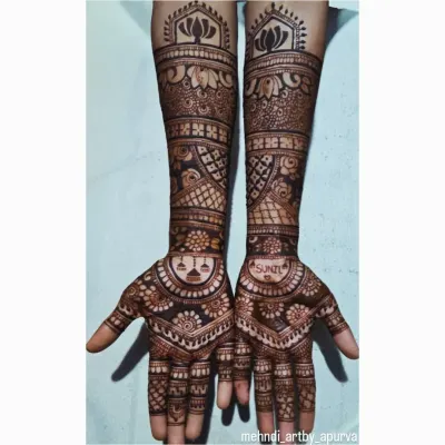 Personalizing your bridal mehendi is my specialty. In this design, I incorporated the groom's name, 'Sunil', on one hand and a 'doli' (palanquin) on the other, telling a part of the wedding story.