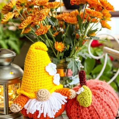 My roly-poly Pumpkin Gnome posing with a cheerful orange pumpkin. He's the perfect little friend to bring out when autumn arrives.