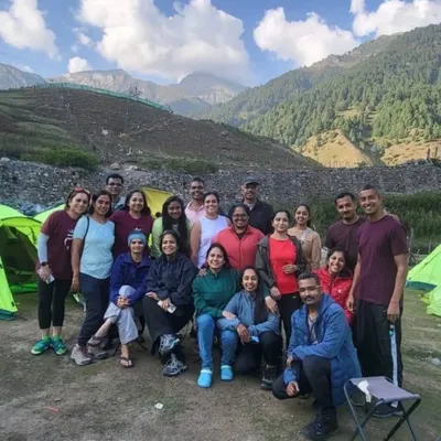 The Aayana family at our campsite during the Kashmir Great Lakes Trek. After a long day of hiking, we gather to share stories, food, and the incredible mountain views.
