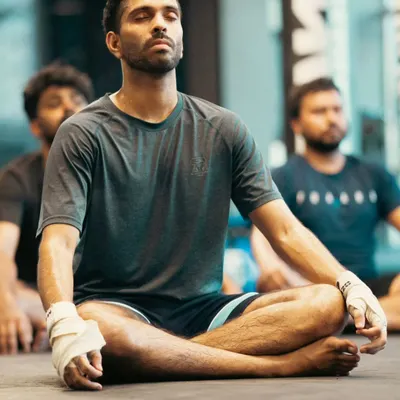 The fight is won in the mind first. We end some sessions with meditation to teach focus, control breathing, and build the mental resilience needed for combat sports.