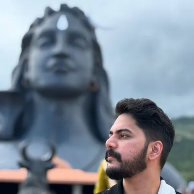 A moment of peace before the Adiyogi statue. My spiritual beliefs are the foundation of my work. For me, it all starts and ends with Mahadev.