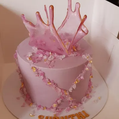 A beautiful custom cake we sourced for a client's birthday. The elegant design features a delicate sugar splash and crystal details, perfect for a sophisticated celebration.