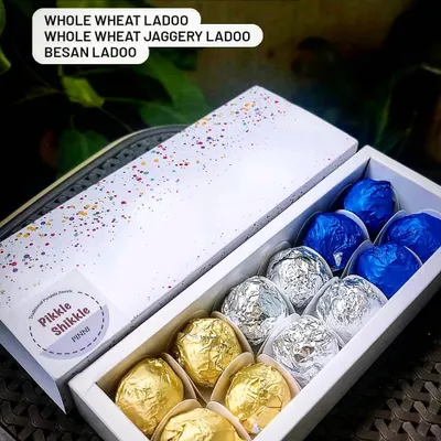 This assorted gift box includes my three types of Pinni: Whole Wheat, Whole Wheat Jaggery, and Besan. It is a perfect way to sample all our traditional ladoo varieties.