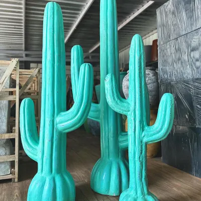 Make a bold, modern statement with our new GRC cactus statues. These vibrant turquoise figures add a fun, desert-chic vibe to your space and require absolutely no watering.