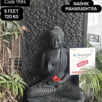 This is my 5-foot, 720 kg black marble Buddha fountain, a significant piece for any large space. The Abhaya Mudra pose, offering protection and fearlessness, is beautifully rendered by my artisans, creating a powerful sense of calm.