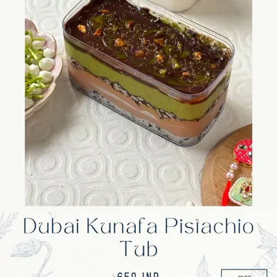 This is my Dubai Kunafa Pistachio Tub, and it's a huge fan favorite. It has layers of cream, crunchy kunafa, and rich pistachio, all topped with a decadent chocolate layer.