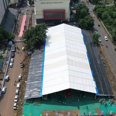 An aerial shot of the massive waterproof tent I set up for the Koli Bhavan Bhumi Pujan in Airoli. This demonstrates my capacity to handle infrastructure for events with thousands of attendees.