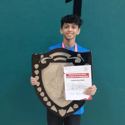 A fantastic achievement for Vihaan, who took first place in the MSSA team event. He is holding the winner's shield and certificate, a result of his consistent training and dedication to the sport.