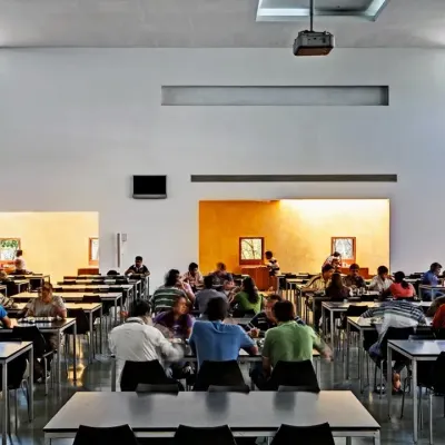 The expansive, light-filled cafeteria at the HP Campus in Bengaluru is designed to be the social heart of the workplace. High ceilings and large windows create an uplifting atmosphere for dining, socializing, and all-hands meetings.