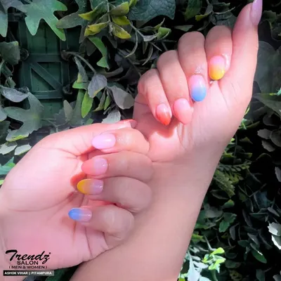This manicure is pure happiness. I created a beautiful pastel rainbow ombre effect across the nails, with each finger blending into a different soft shade for a dreamy and colorful look.