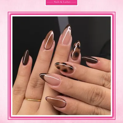 Unleash your wild side with this chic animal print design. Combining a rich brown with a classic leopard spot pattern and a modern French tip, this look is fierce and fashionable.