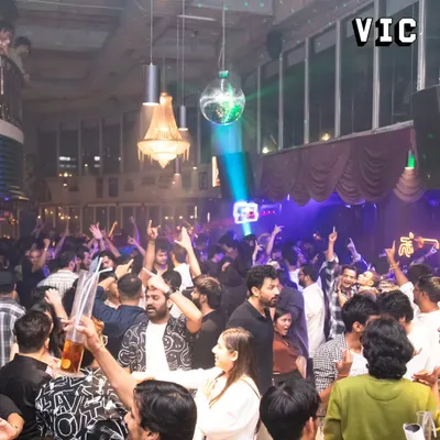 A packed house at Sarjapur Social for a high-energy Bollywood and Punjabi night. The crowd's energy, with hands in the air, is what I feed off all night long.