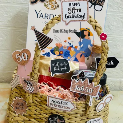 Celebrating a fabulous 50th birthday. This hamper is packed with fun quote cutouts like "Aged to Perfection" and "Fab 50," along with pampering essentials from Enn Beauty and Yardley London.