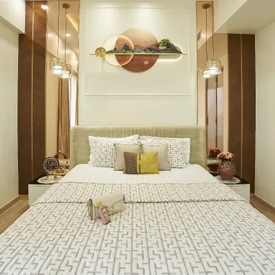 This bedroom is all about quiet confidence. The centerpiece is the unique 3D wall art above the bed, which is complemented by hanging pendant lights. The neutral color scheme with pops of yellow creates a calm yet cheerful space.