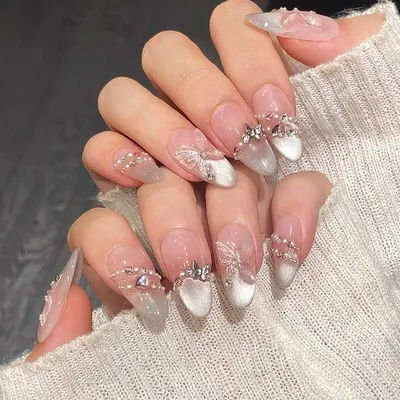 This intricate bridal set is one of our signature looks, featuring a delicate cat-eye base with hand-placed crystals and 3D butterfly details. It’s the ultimate statement for a bride who wants luxury and detail.