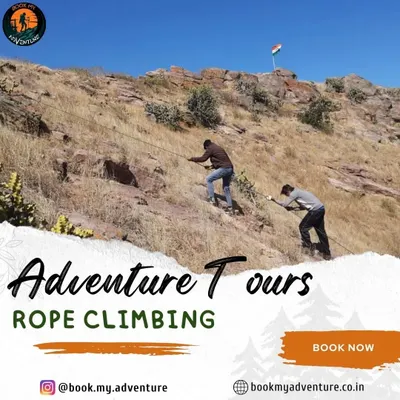 Two adventurers practice rope climbing on a rocky incline. This activity is a great test of strength and endurance, and we provide all the safety equipment and guidance needed to help you reach the top.