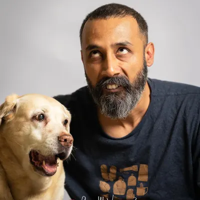 This is me and my senior dog, Laika. She's the reason I started this journey. My goal is always to capture the unique personality of every animal I meet.