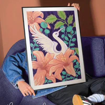 Here is my crane and lily illustration presented as a large, framed wall art piece. I love how the dark background makes the colors of the flowers and the white crane pop.