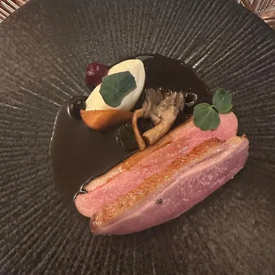 Magret of Duck, a classic French dish. The duck is cured in five spice and cooked a la rosé, served with sunchoke, wild mushrooms, and a rich Sauce Robert.