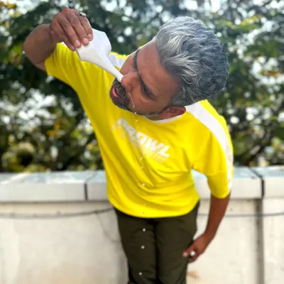 An instructor demonstrates Jal Neti, a yogic technique for nasal cleansing using a neti pot. This practice is excellent for clearing the sinuses and improving respiratory health.