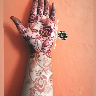 These are stain goals! This is the beautiful, deep reddish-brown color you get from high-quality, natural henna and proper aftercare.