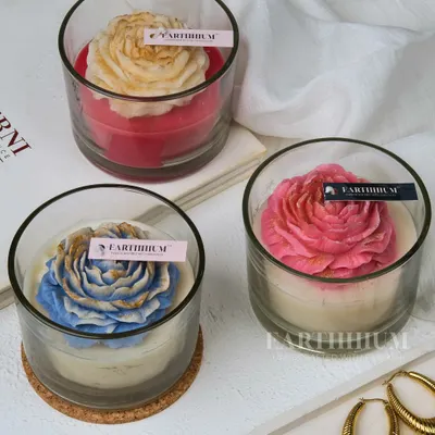 My Peony Flower candles bring a touch of springtime magic indoors. This collection shows the variety of colors, from soft pink to a dreamy blue, each dusted with a little gold for extra sparkle.