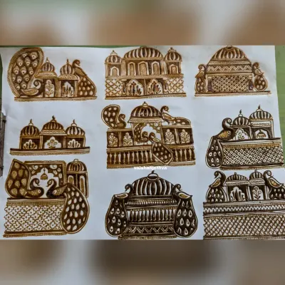 Practicing different styles of startup elements. This sheet shows various designs for palaces and peacocks, which are essential components of bridal mehndi.