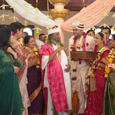 Deep and Shagun, a Happiness Teacher and a techie, received blessings from Gurudev at their wedding. Their union, originating from Prayagraj and Shimla, is a beautiful example of a partnership founded on grace.