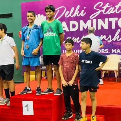 Our players on the podium at the Delhi State Ranking Badminton Tournament. This picture captures the success of Reyansh, Rajas, and Vatsal after their amazing performances in singles and doubles.