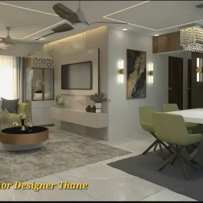 A wide view of a contemporary living and dining area, showcasing a cohesive design language. We integrated a floating TV console, a comfortable L-shaped sofa, and a six-seater dining set, all tied together with a neutral color palette and warm lighting.