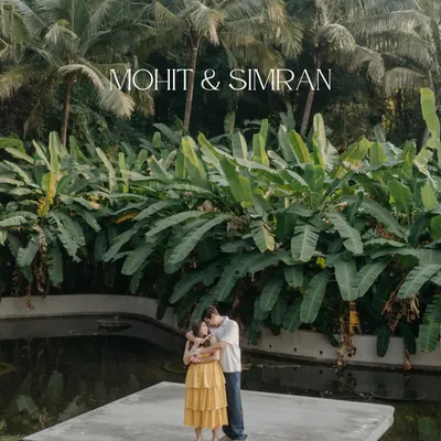 An embrace surrounded by lush tropical greenery. This beautiful portrait of Mohit and Simran uses the natural environment to create a vibrant and romantic frame.