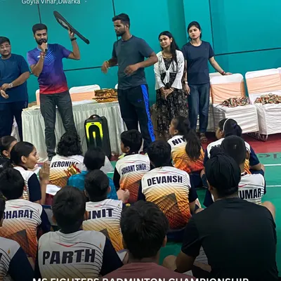 A coaching moment during the MS Fighters Badminton Championship. I believe in providing guidance and encouragement to young athletes during competitions.