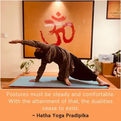 As the Hatha Yoga Pradipika says, postures must be steady and comfortable. Here I am in Vasisthasana (Side Plank Pose), finding that balance of effort and ease.