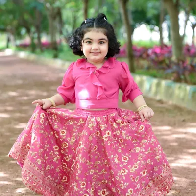 A beautiful portrait of a little girl enjoying a day at the park. The natural lighting of outdoor photoshoots creates such a warm and lovely feel.
