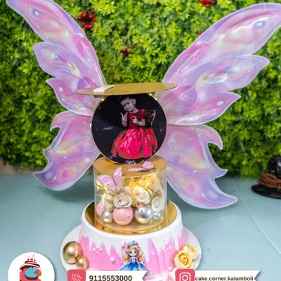 A truly magical, multi-tier fairy cake with a custom photo and light-up butterfly wings. This is a showstopper for any little girl's dream birthday party.