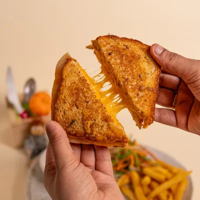 You can't go wrong with a classic grilled cheese sandwich, and ours is extra gooey and delicious! Served with a side of fries, it's the ultimate comfort food to refuel after a long play session.