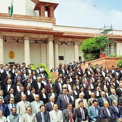 A group photograph at the Supreme Court. It was an honor to sit on a bench for the day to contribute to the court's efforts to settle cases and speed up the justice system where possible.