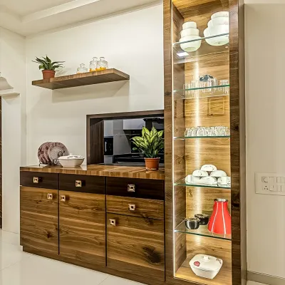 A beautiful crockery unit in a rich wood grain finish. It features a tall, glass-enclosed display cabinet with integrated lighting, alongside a buffet counter with ample closed storage below.